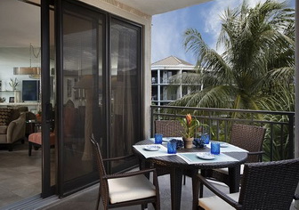 Vacation rental property balcony dining table located at the 1800 Atlantic Resort