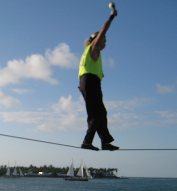 Tight rope walker performing during the Mallory Square sunset celebration